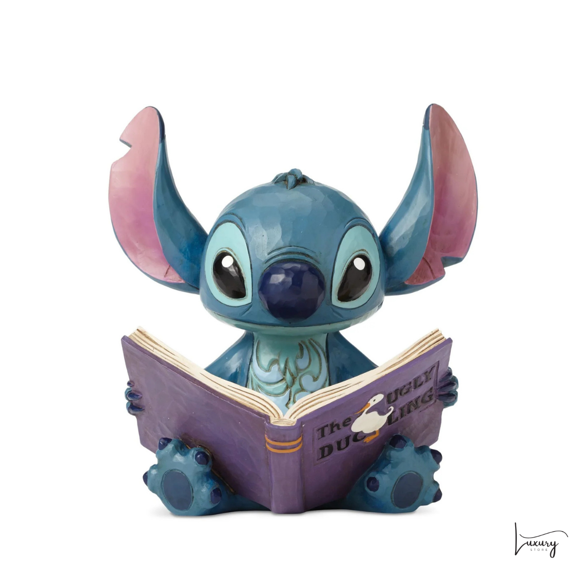 Disney Tradition Figurina Stitch con libro