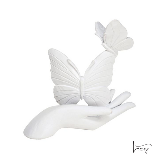 Wald Scultura in resina "Mano con farfalla"
