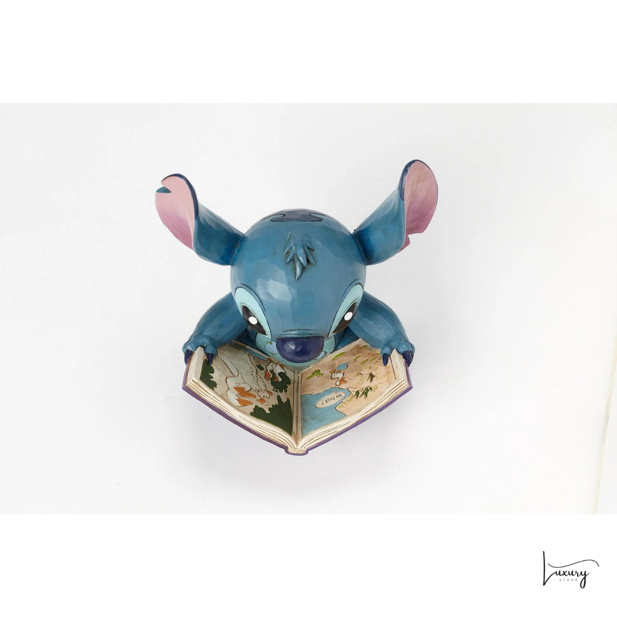 Disney Tradition Figurina Stitch con libro