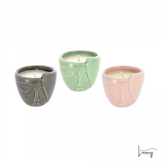 Candela profumata volto stilizzato in ceramica