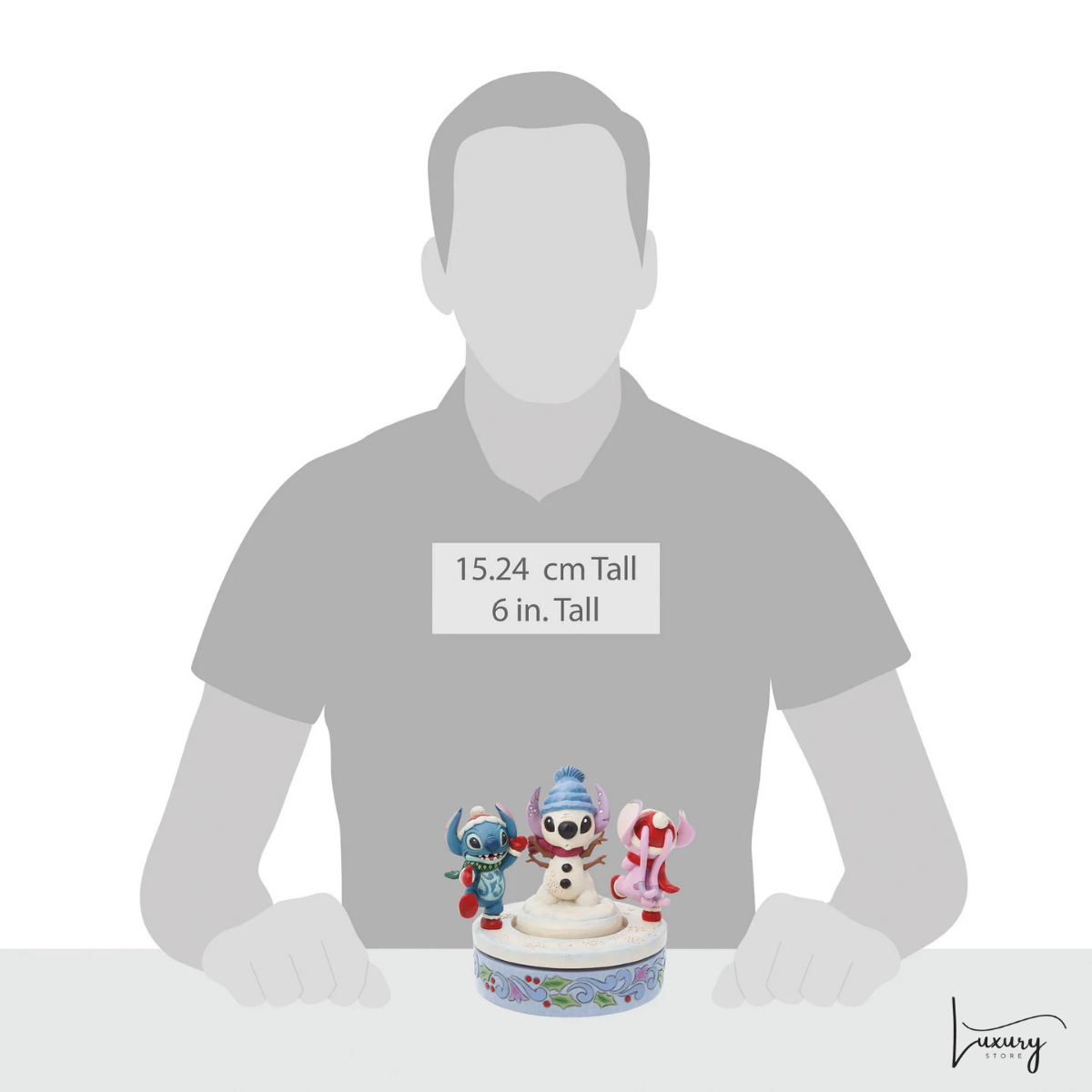 Disney Tradition  Figurina Stitch and Angel con pupazzo di neve