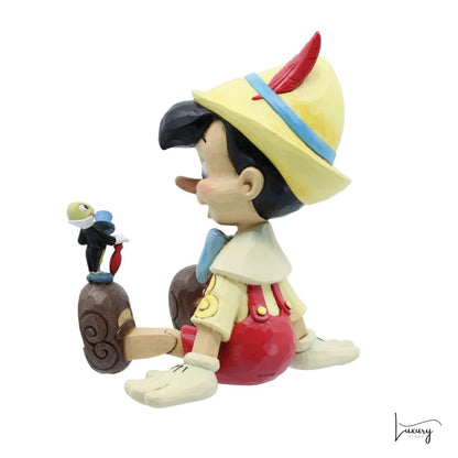 Disney Traditions Figurina Pinocchio con grillo parlante – Jim Shore