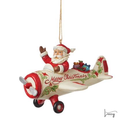 Jim Shore Figurina Babbo Natale su aereoplano