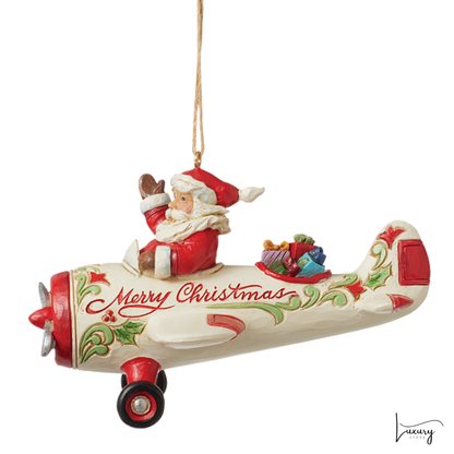Jim Shore Figurina Babbo Natale su aereoplano